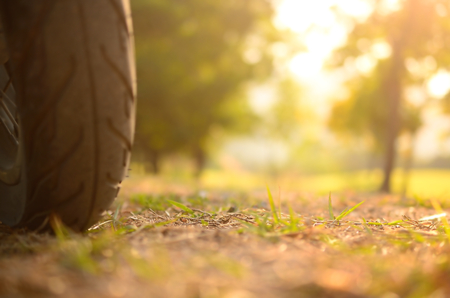 Blur motor bike wheel on country road abstract background. Travel concept.の写真素材