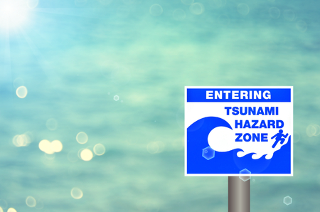 Tsunami sign on blur tropical beach abstract background.の写真素材