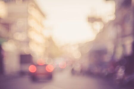 Blur traffic road with bokeh light abstract background. Retro color style.の写真素材