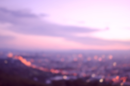 Blur city in sunset abstract background.