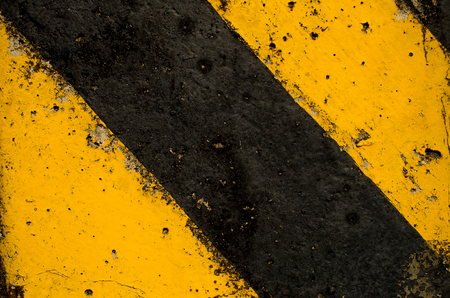 Traffic sign black and yellow color texture background.