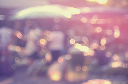Blur people walking in local market abstract background.Retro color style.の写真素材