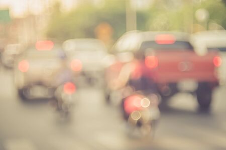 Blur traffic road with bokeh light abstract background.Retro color style.