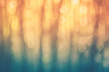 Nature green bokeh sun light abstract background. Retro color style.