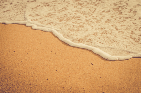 Copy space of smooth wave sunset beach. Travel concept. Retro color style.の写真素材