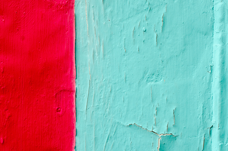 Old grunge red and blue stone wall texture background.の写真素材