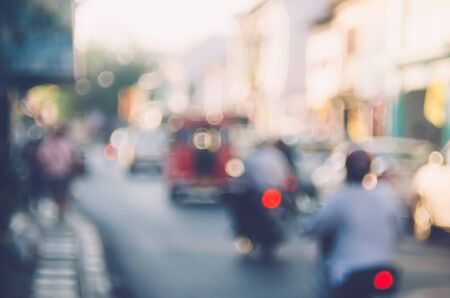 Blur traffic road with bokeh light abstract background.Retro color style.の写真素材