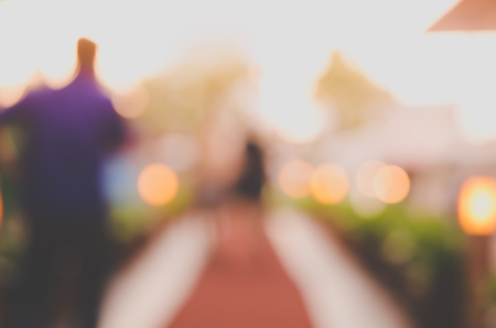 Blur people walking in shopping center mall abstract background. Copy space of business travel...