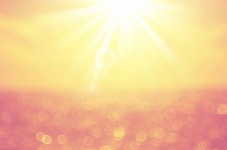 Blur tropical sunset beach with bokeh light wave abstract background. Copy space of outdoor summer...