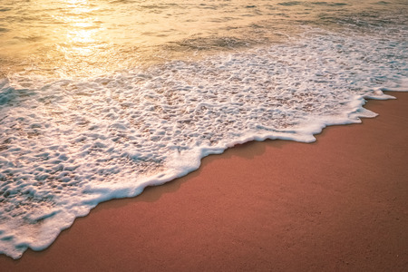 Sunset beach and smooth wave abstract texture background. Copy space of summer vacation and business...
