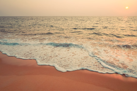 Tropical beach with sunset sky and cloud background. Copy space of summer vacation and holiday travel freedom concept.の写真素材