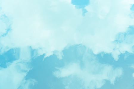 Abstract of surface smooth wave river reflection blue sky and white texture background. Copy space nature environment and travel relax concept. Vintage tone filter effect color style.の写真素材