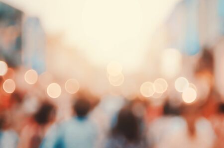 Blur people shopping in local street market with colorful bokeh abstract background. Copy space of travel and business concept. Vintage tone filter color style.の写真素材