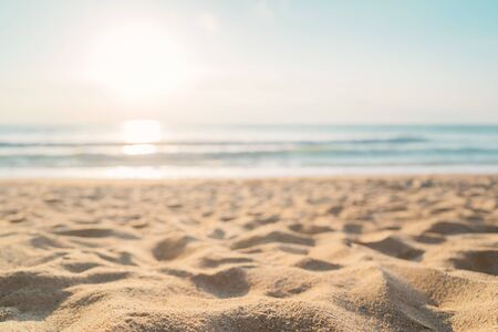 Tropical beach with smooth wave and sunset sky abstract background. Copy space of business summer vacation and travel adventure concept. Vintage tone filter effect color style.の写真素材