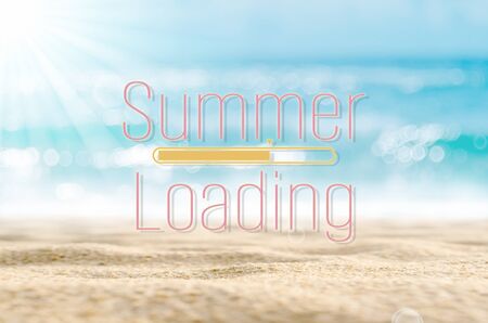 Summer loading words on blur tropical beach with bokeh sunlight wave abstract background. Summer...