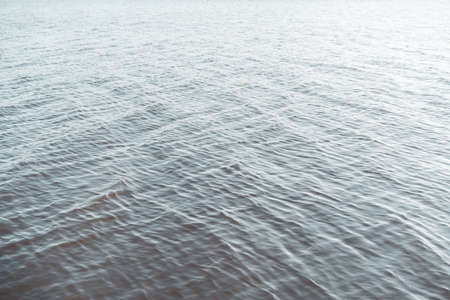 Copy space of surface wave water texture abstract background. Vintage tone filter color style.