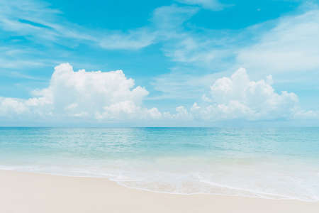 Beautiful tropical beach with blue sky and white cloudsの写真素材
