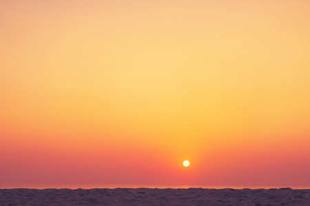 Tropical beach with smooth wave and sunset sky