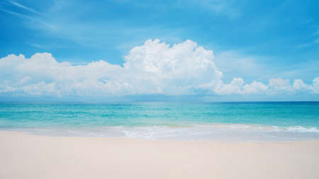 Beautiful tropical beach with blue sky and white clouds