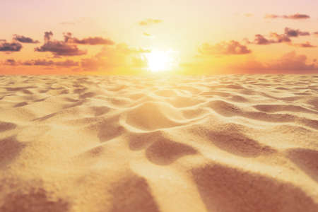 Tropical beach with smooth wave and sunset sky abstract background. Copy space of business summer vacation and travel adventure concept. Vintage tone filter effect color style.の写真素材