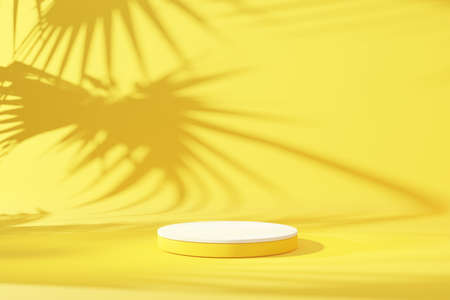 Podium and palm leaf shadow on yellow wall abstract background. Copy space of product presentation and tropical summer concept. 3D render graphic design.の写真素材
