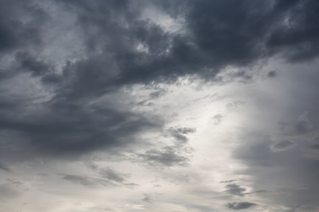 Begins a strong thunderstorm, heavy dark cloudsの写真素材