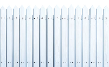 A pristine white picket fence stands tall against a clean backdrop, symbolizing tranquility and classic charm in residential landscapes. Ideal for projects focused on home and safety.の素材