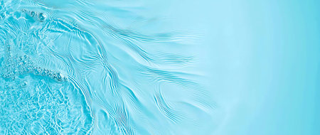 Abstract close-up of turquoise water with smooth waves and ripples creating a serene, tranquil atmosphere. Perfect for themes of nature, relaxation, and aquatic environments.の素材