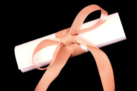 Love letter with bow, isolated against black backgroundの写真素材