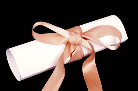 Love letter with bow, isolated against black backgroundの写真素材
