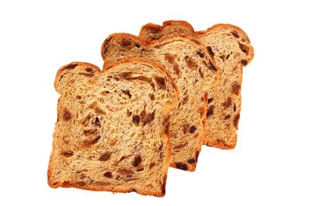 Slices of raisin bread, isolated against backgroundの写真素材