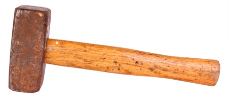 Old rusty hammer (fist), isolated against backgroundの写真素材