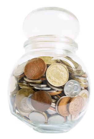 Jar with several coins, isolated on backgroundの写真素材