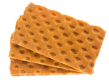 Healty square crackers (knackebrod), isolated against backgroundの写真素材