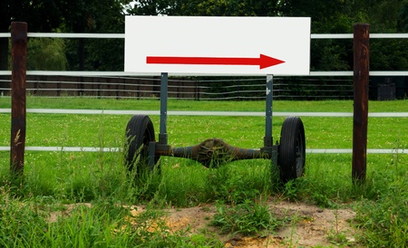 Empty arrow sign on wheel axleの写真素材