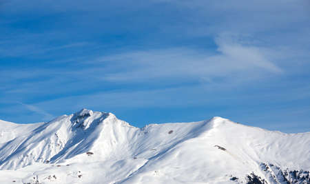 Snow mountain with blue skyの写真素材