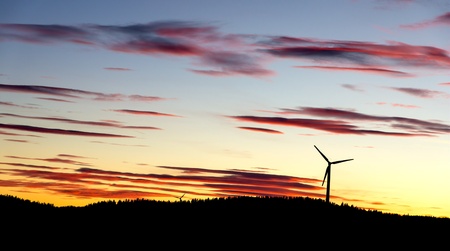 Windmills in germany during sunsetの写真素材