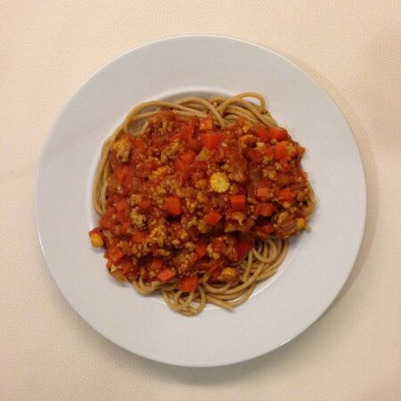 Home made spaghetti in white dish.の素材