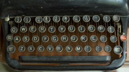 Vintage typewriter on wooden table