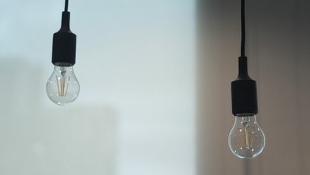 Double turn off hanged down lamp in the officesの写真素材