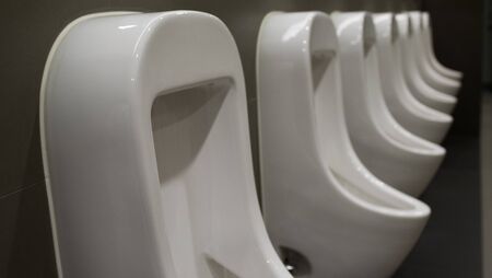 Urinals in restroom, office building, Bangkok Thailandの写真素材