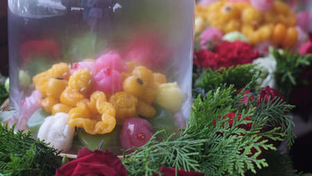 Thai desserts in glass bowl decorated with greeneriesの写真素材
