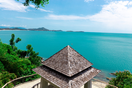 Kayaking tourists at the bright sea at the sea view point at Chaweng, Koh Samui, Thailand.