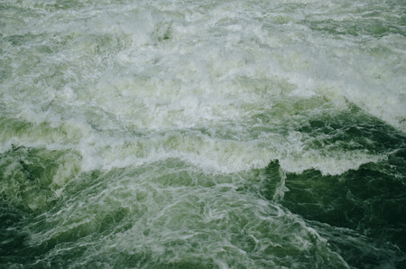 Flowing green waterの写真素材