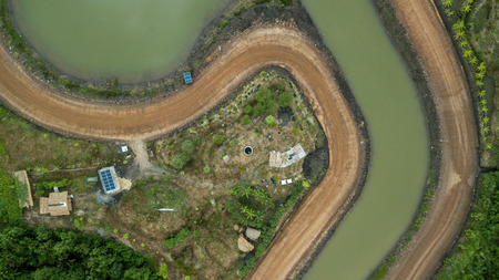 Aerieal View Solar Cell Building Rooftop Small House Countryside Use for Agriculture and Electricity in the houseの写真素材