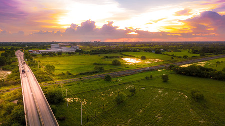 Aerial Photo Countryside Car Running on Road Bridge Over Railway Bypass route the City and Golden...