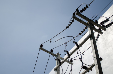 Electric line hight volt Installed near the office buildingの写真素材