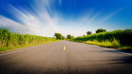Motion on beautiful road go straight ahead blue sky