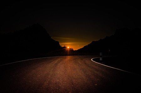Dark Curve Road at Evening Sun Down  
Less lightの写真素材