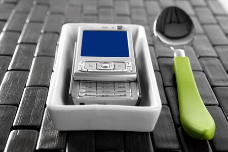 Good morning, Technologic menu with spoon and  mobile phone の写真素材